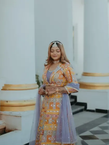 A serene portrait of the groom's sister-in-law. The makeup is soft and glowing, perfect for a day wedding.