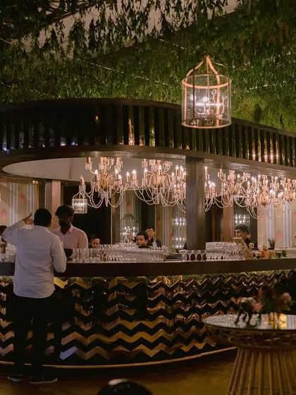 A look at the 30-foot all-access bar we designed and produced for a Sangeet in Bangalore. With its intricate design and surrounding engagement zones, it became the vibrant centerpiece of the evening.