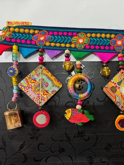 This custom piece, 'The Summer Song' Toran, was completed in just one day and has already been shipped to its new home. I love the combination of the fish, kites, and thread-wrapped rings.