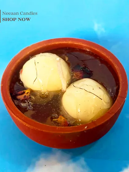 Not edible, but just as sweet. Our Rasgulla candle in a traditional earthen pot is for when your room deserves a dessert too.