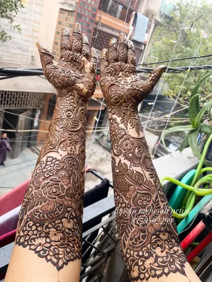Another angle of a full bridal design, showing how the pattern wraps around the arms.