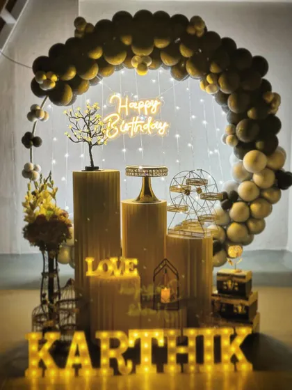 This static shot captures the moody and elegant feel of the black and gold birthday theme, perfect for evening celebrations at home.