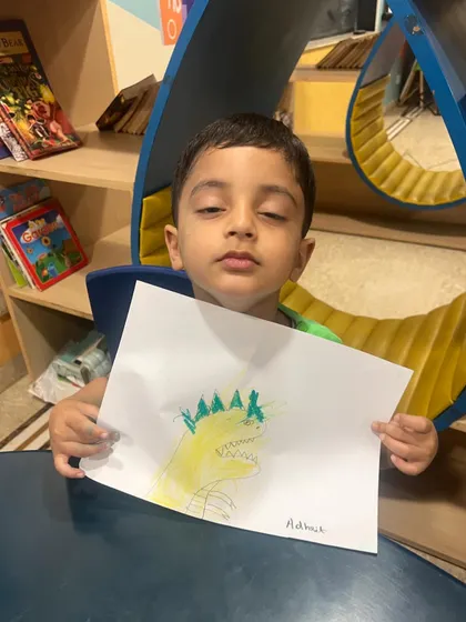Another proud artist with his creation from science camp. Even our scientific explorations include opportunities for drawing and self-expression.
