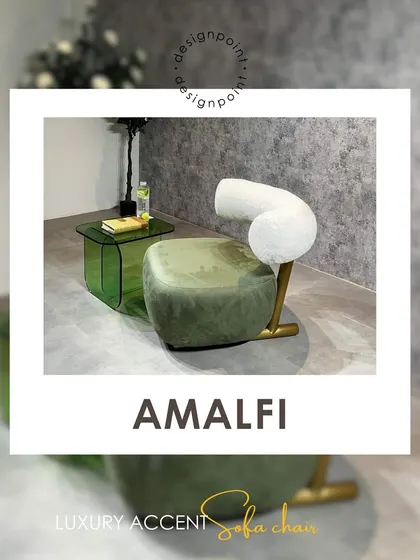 The 'Amalfi' luxury accent chair combines a unique, sculptural form with rich materials. The green velvet seat and curved bouclé backrest create a stunning visual contrast.
