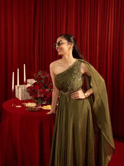 A candid, joyful moment from a campaign shoot. This lifestyle approach helps customers envision themselves in the clothes, making it effective for commercial brands.