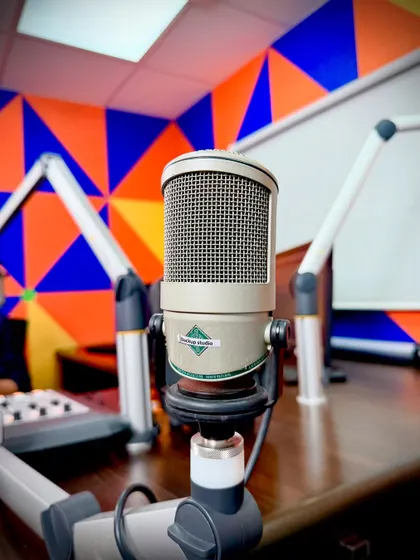 A close-up of the microphone at the Radio City studio. This image symbolizes my role as a voice of inspiration and expertise in the community.