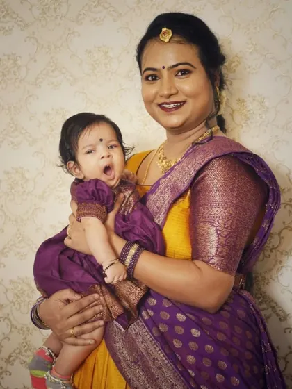 A precious moment between mother and daughter. The makeup is designed to be long-lasting and comfortable, perfect for a busy mom on a special day.
