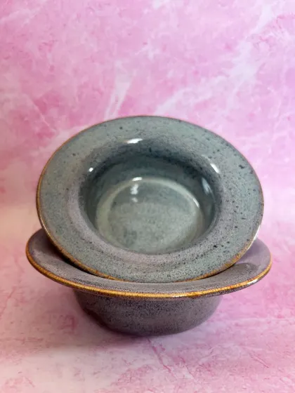 A pair of my handmade pasta bowls, stacked to show their form. They are designed to be both beautiful on the table and practical for everyday use.
