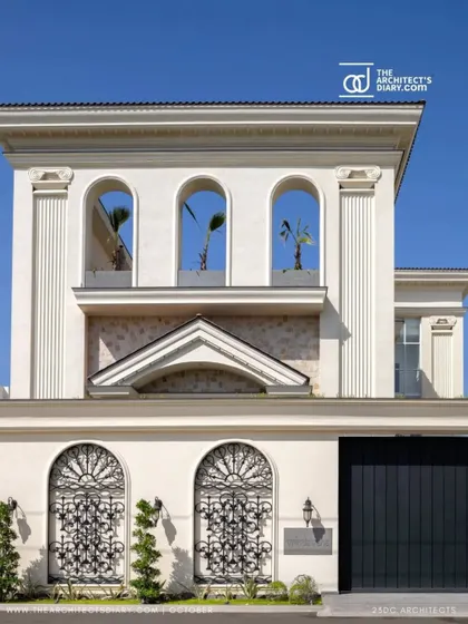 The facade of The Ivory Royale, featured in The Architect's Diary, showcases classical arches and intricate ironwork. This design blends English architectural influences with Indian artistry to create a unique and regal home.