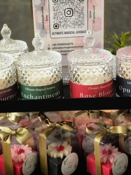 A close-up of my exhibition display, showing the Crystal Jar candles and some of my floral gift boxes.