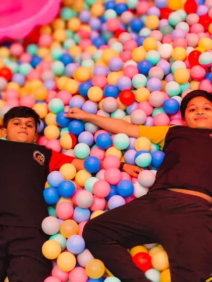 Just chilling in a sea of colorful balls. My massive ball pit is a favorite spot for students to relax and play during their school trip.