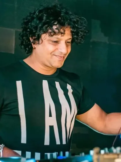 A candid shot while I'm focused on the music. My love for music is what drives every single performance, whether it's for a small private party or a huge festival.