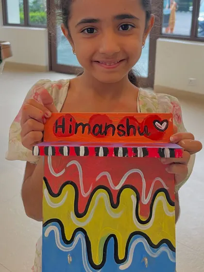 An abstract and vibrant nameplate, a unique and personal gift for Father's Day.