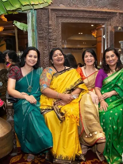 A group photo with guests and team members at the book launch.