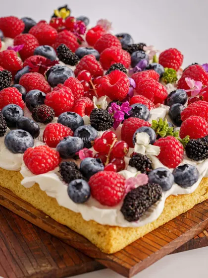 Another look at my Vanilla Sheet Cake with White Chocolate Mousse and Fresh Berries. The simplicity of a sheet cake allows the quality of the ingredients to shine.