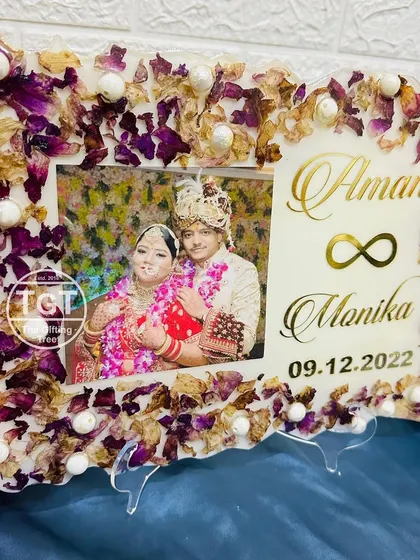 Here is another 9x12 inch frame with a different color scheme, using white and purple petals with pearl accents for a softer look.