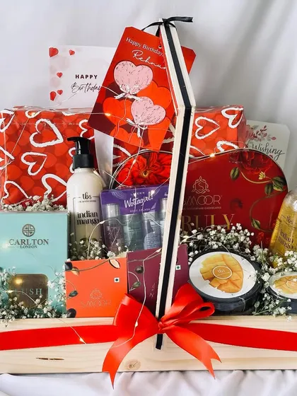 Another angle of the red-themed birthday hamper, showing the thoughtful curation of items to create a special and personalized gift.