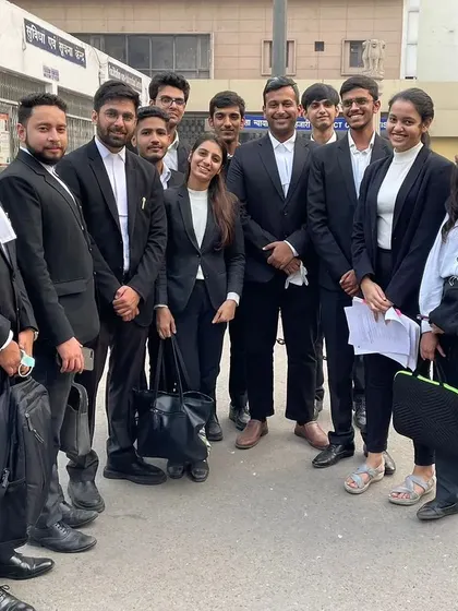 A candid team photo in the court corridors. We support each other through the long and often demanding days of litigation.