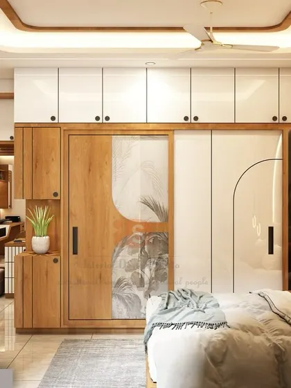 This bedroom render showcases a design with a large sliding wardrobe featuring custom art panels, and a dedicated dressing area visible in the background.