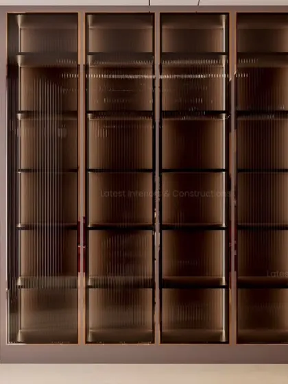 A close-up of the bespoke crockery unit, featuring fluted glass doors and internal lighting. This piece demonstrates my commitment to detailed craftsmanship and creating custom furniture that elevates the space.