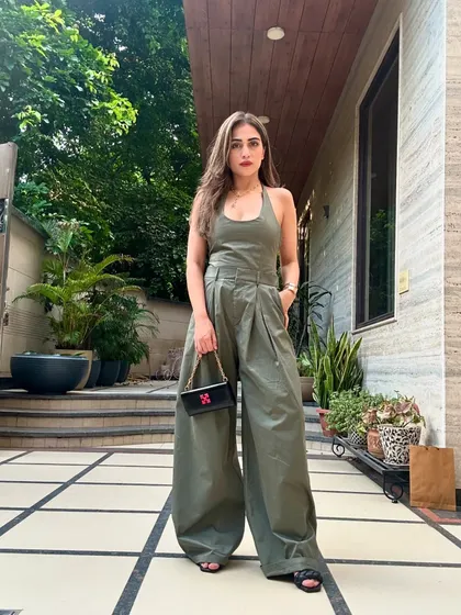 Another shot of the Zara jumpsuit. It’s a complete outfit that makes a statement on its own.