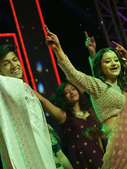 A beautiful shot of the couple sharing a dance during their Sangeet. These choreographed moments are designed to tell their story, creating a centerpiece for the evening's performances.