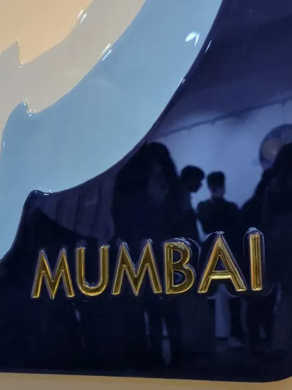 A close-up of the "Mumbai" text on my conceptual map artwork. The golden acrylic lettering adds a touch of elegance to the piece.