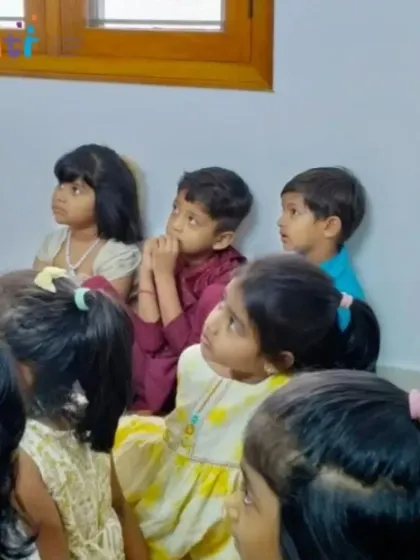 The focused and curious expressions on the children's faces as they listen to a story. We create an environment where children feel comfortable and eager to learn.