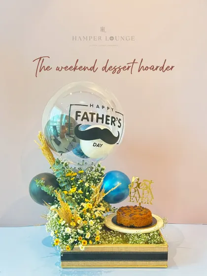 For the weekend dessert hoarder dad, this hamper includes a delicious cake, a "Dad Ever" cake topper, and a festive balloon arrangement.