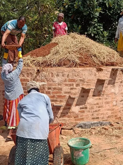 Teamwork in action as our crew works on a brick structure. Our projects are a collaborative effort, where everyone learns from each other.