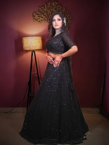 Another full-length shot of the black sequin lehenga, perfect for making a statement.