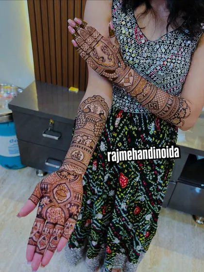 A full-arm bridal design featuring story panels with elephants and other traditional figures. This style of mehndi tells a story, making it a unique piece of art for the bride.