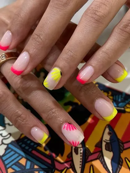 A full view of the vibrant and playful neon French manicure, perfect for anyone who loves a pop of color.