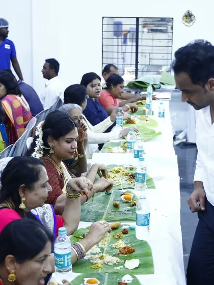 A guest interacts with our team during a sit-down meal, showcasing our friendly and attentive service style.
