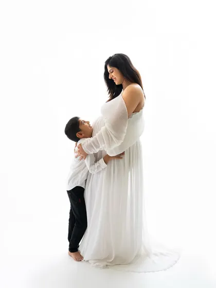 There's a special kind of glow that every mommy-to-be has. In the studio, we can create these elegant, classic portraits that celebrate this incredible time in your life, showing the beautiful bond you already share with your little one.