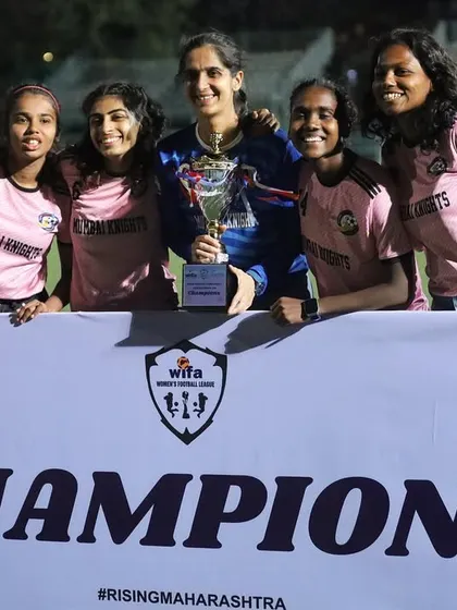 Players and staff posing with the WIFA championship trophy. This victory belongs to everyone in the Mumbai Knights family.