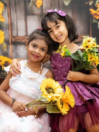 A beautiful portrait of two friends sharing a moment. Sibling and friendship photoshoots are a wonderful way to document the special bonds that children form.
