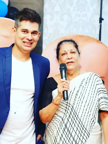 Posing with a happy grandmother who enjoyed the birthday festivities. My goal is fun for all ages.