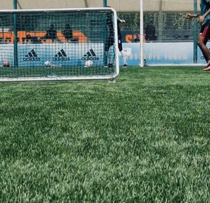 A view of the training ground setup, with small goals used for specific finishing and passing drills. We use varied equipment to keep sessions challenging and effective.