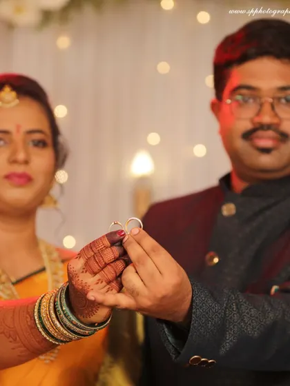 A fun shot of the couple showing off their engagement rings. We focus on creative ways to document this important milestone.