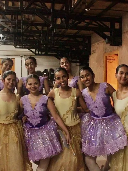 Backstage smiles before performing in "Step in Time." Our collaborations are a source of joy and creative energy for our dancers.