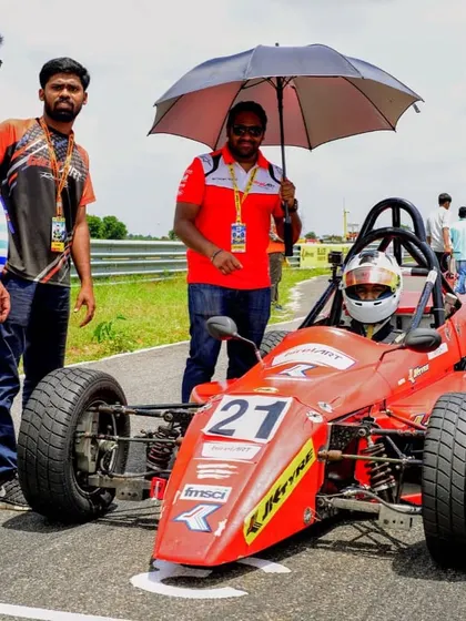 A duplicate shot of our driver and engineer on the grid, emphasizing the crucial relationship and communication needed for success in formula racing.