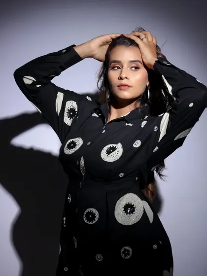 A more dynamic pose in the patterned shirt. This shot shows off the model's hair and adds a sense of movement to the portrait.