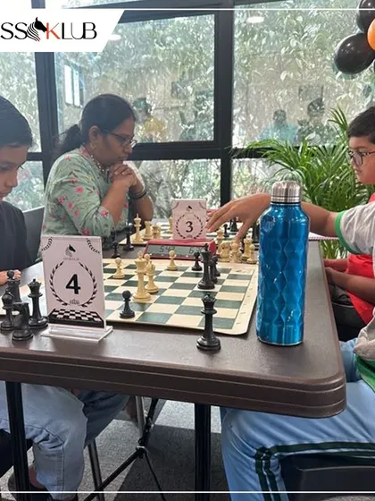 Young minds at work. Children focus intently on their game during a tournament at our JP Nagar center, showcasing the strategic thinking we nurture.