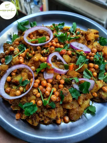 My special 'Aloo mixture' recipe, a simple and comforting snack made with potatoes and peas.