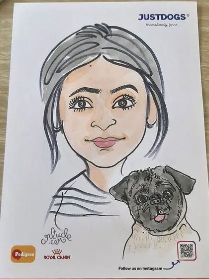 A charming live drawing of a woman and her pug.