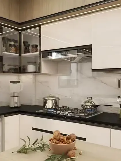 A compact kitchen that cleverly fits a washing machine under the counter, showcasing efficient space planning.