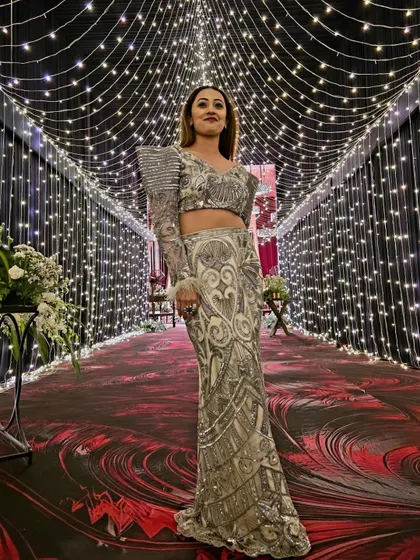 A full-length shot of my glamorous Ludhiana outfit. The structured shoulder and intricate sequin work made this a true showstopper.