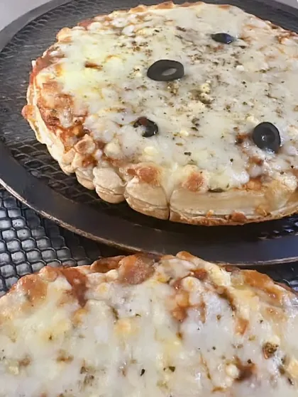 Our unique Waffle Pizza is a fun and creative dish that guests of all ages love. A savory waffle base is topped with pizza sauce, cheese, and olives for a delightful fusion snack.