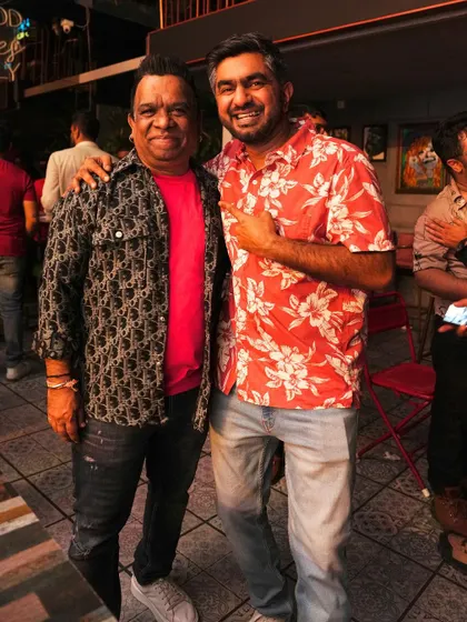 Posing with a friend at our midweek party.